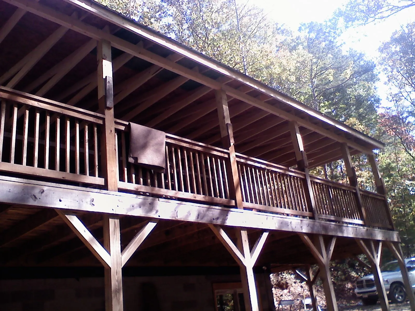 Timber framing under a new elevated porch and deck — Roof Leak Repair in Moriches by Roofing Brothers